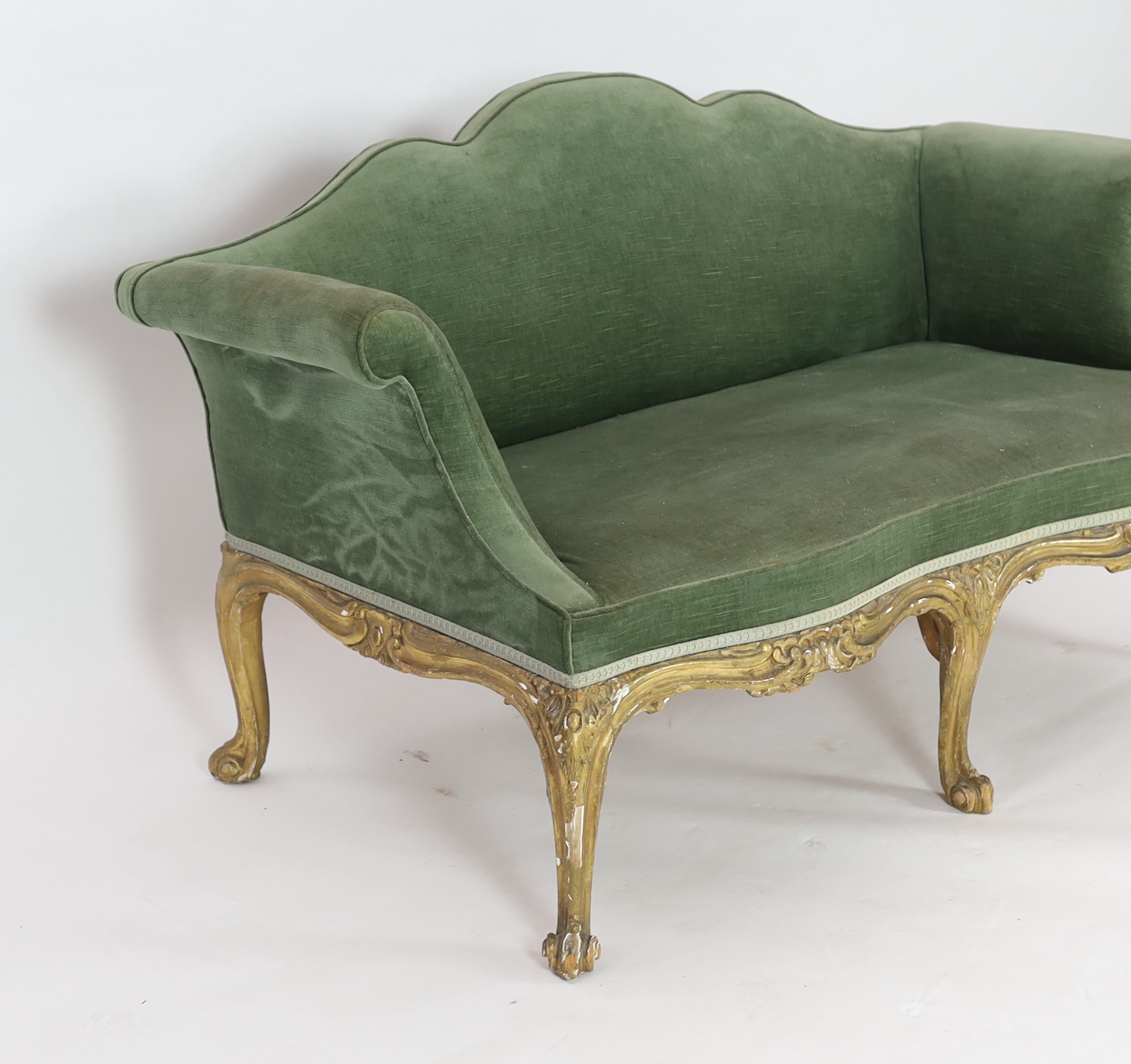 A mid 18th century Louis XV style giltwood settee 156cm wide, 82cm deep, 86cm high